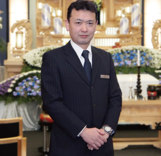 担当者